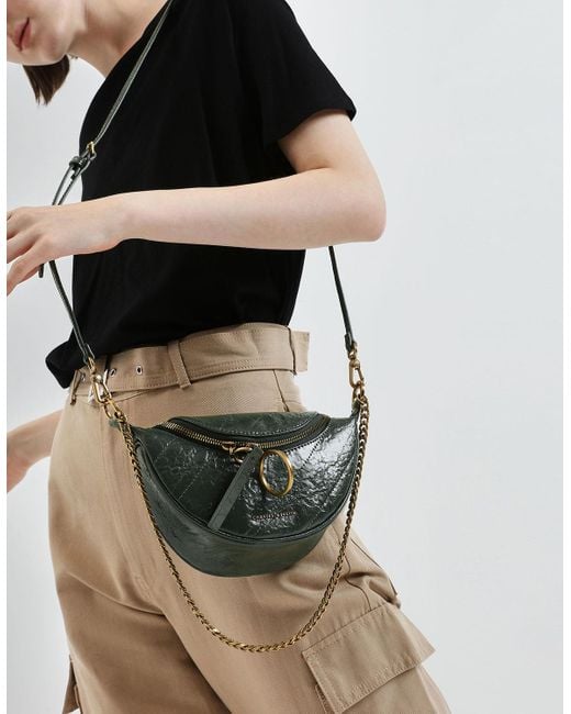 Round metal accent online wrinkled effect bag