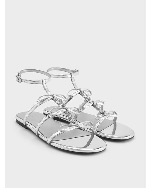 Charles & Keith White Metallic Gem-Embellished Bow T-Bar Sandals