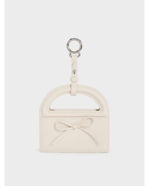 Charles & Keith Natural Reese Bow Top Handle Wristlet