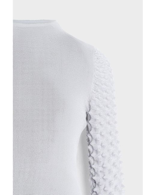 Charles & Keith White Spike Textured Long Sleeve Top