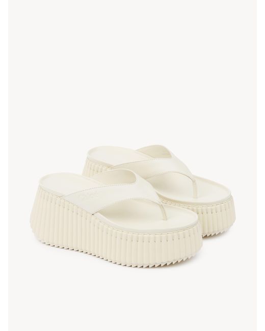 CHLOÉ NAMA WEDGE SANDAL 8 CM IN BLACK SUEDE AND WHITE RUBBER