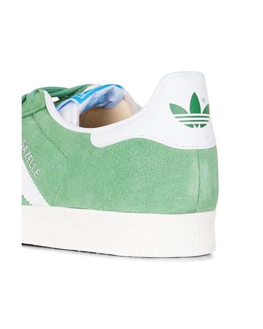 Baskets basses Adidas pour homme en coloris Green