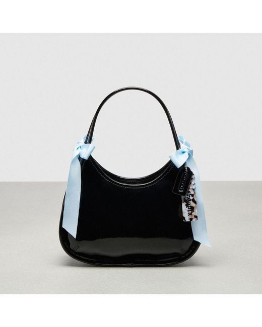COACH Black Ergo Bag In Crinkle Patent Topia Leather With Bows