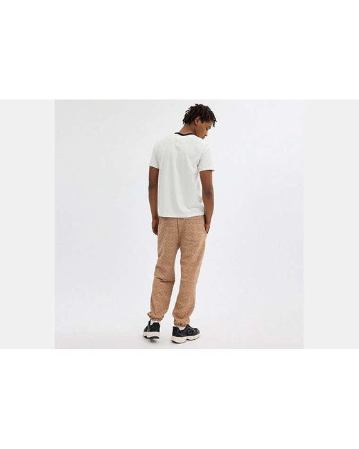 Pantalon de jogging Essentiel signature COACH pour homme en coloris Brown