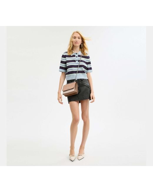 Bolso cruzado Klare de lona de firma COACH de color Black