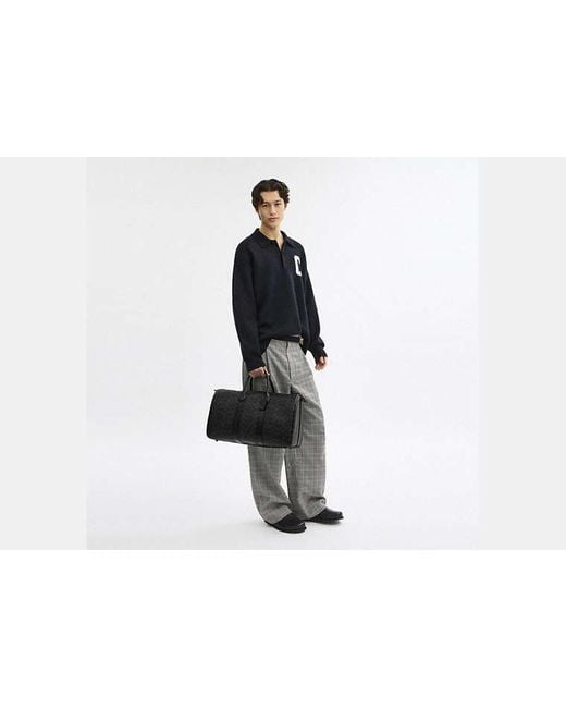 COACH Black Compass Bag 45