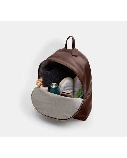 COACH Brown Kisslock Frame Backpack
