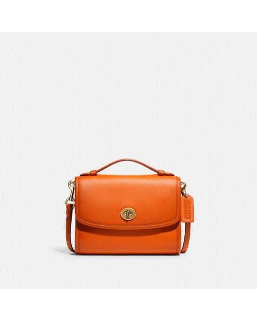 COACH Leather Kip Turnlock Crossbody in Orange Lyst Canada