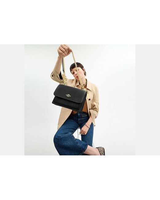 Mini Sac À Porté-Croisé Klare COACH en coloris Black