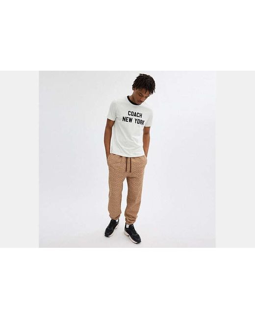 Pantalon de jogging Essentiel signature COACH pour homme en coloris Brown