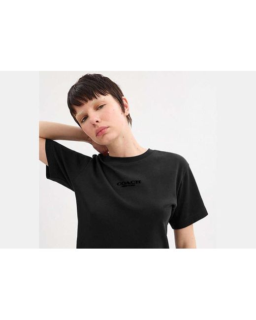 Haut COACH en coloris Black