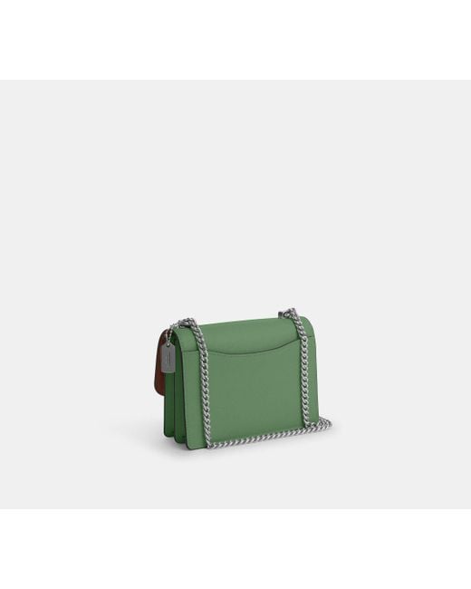Bolso cruzado Mini Klare COACH de color Green