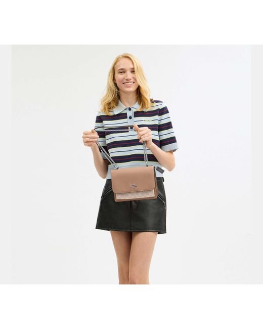 Bolso cruzado Klare de lona de firma COACH de color Black