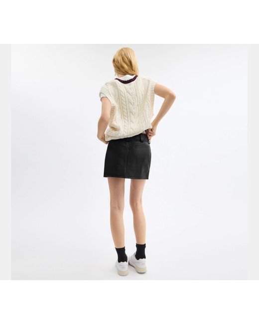 Minifalda de piel COACH de color Black