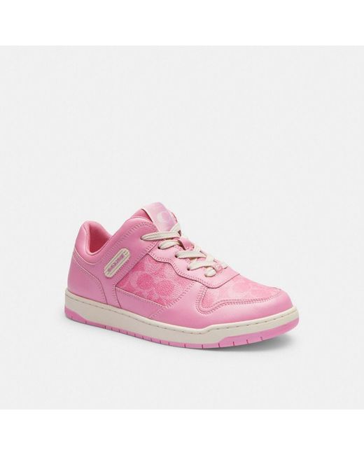 Chaussures de sport basses en toile signature C201 COACH en coloris Pink