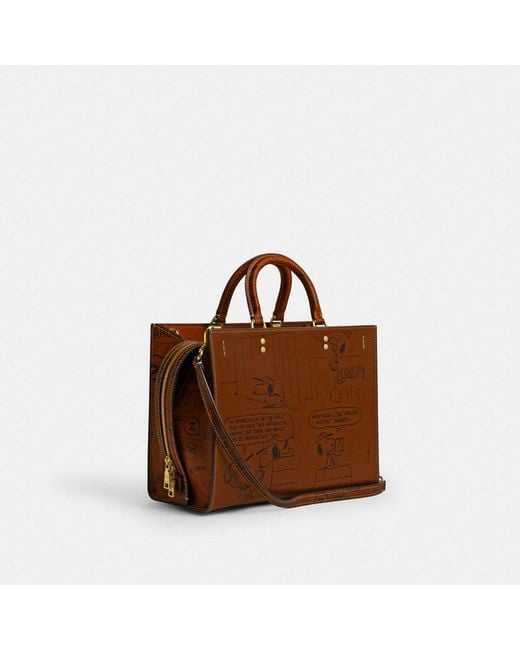 COACH X Peanuts Rogue Bag With Newspaper Print in Brown | Lyst