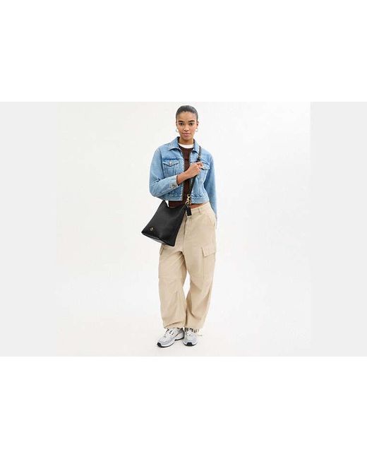 Grand Sac À Porté-Épaule Laurel COACH en coloris Black