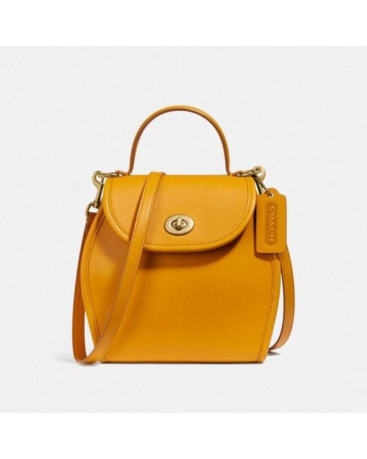 COACH Yellow Turnlock Curved Top Handle Crossbody
