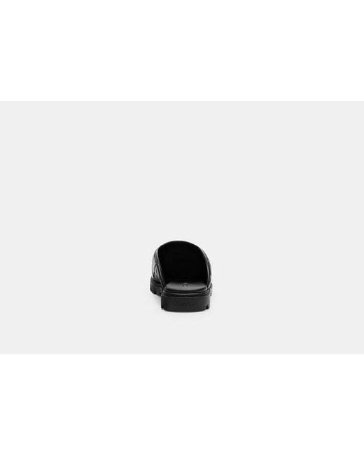 Sabot Alyssa avec matelassage COACH en coloris Black