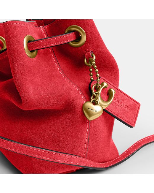 COACH Red Jade Drawstring Bag