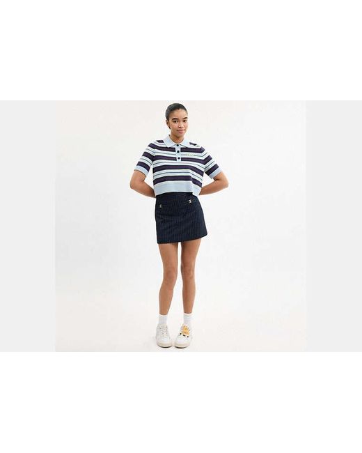 Minijupe Ajustée Avec C Traditionnel COACH en coloris Blue