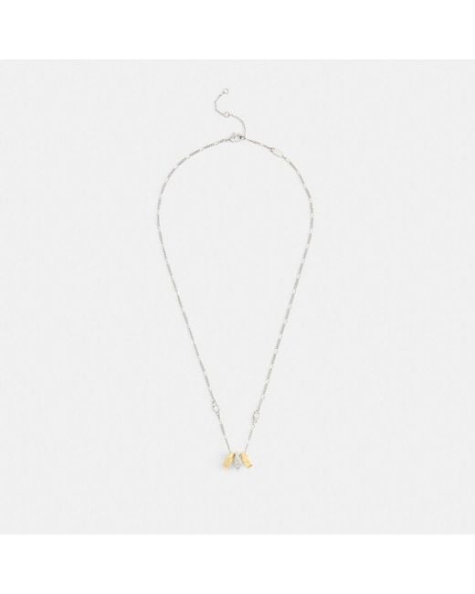 COACH Metallic Signet Ring Rondell Pendant Necklace