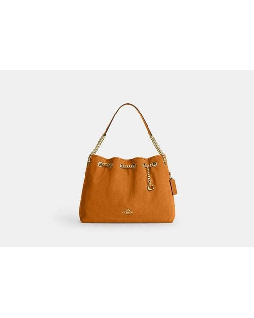 COACH Black Evelyn Shoulder Bag With Quilting And Charm