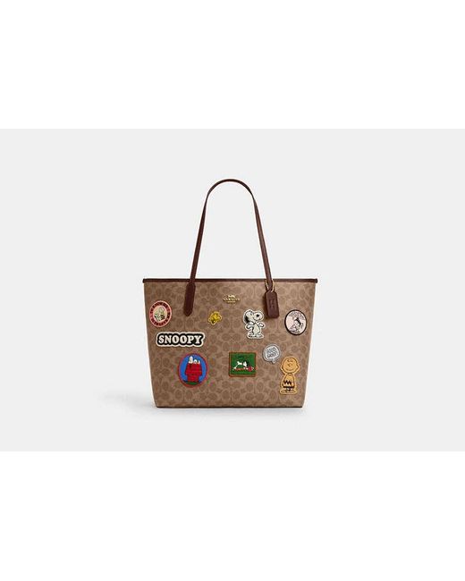 Borsa Larga City X Peanuts di COACH in Black