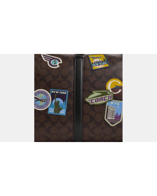 Coach voyager bag with travel patches deals