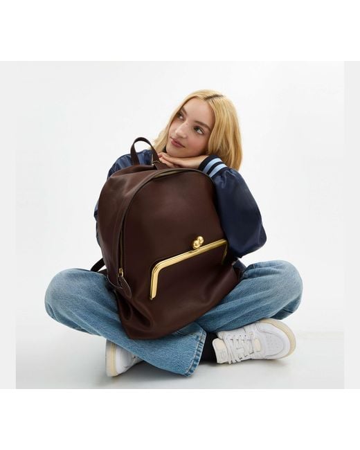 COACH Brown Kisslock Frame Backpack