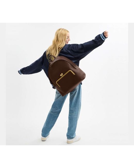 COACH Brown Kisslock Frame Backpack