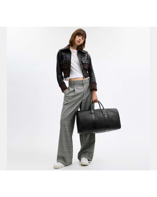Bolsa Compass 50 COACH de color Black