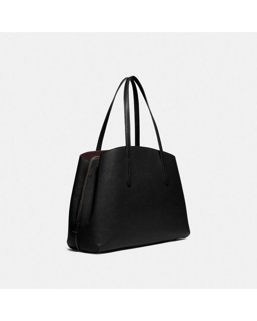 coach polished pebble leather charlie carryall