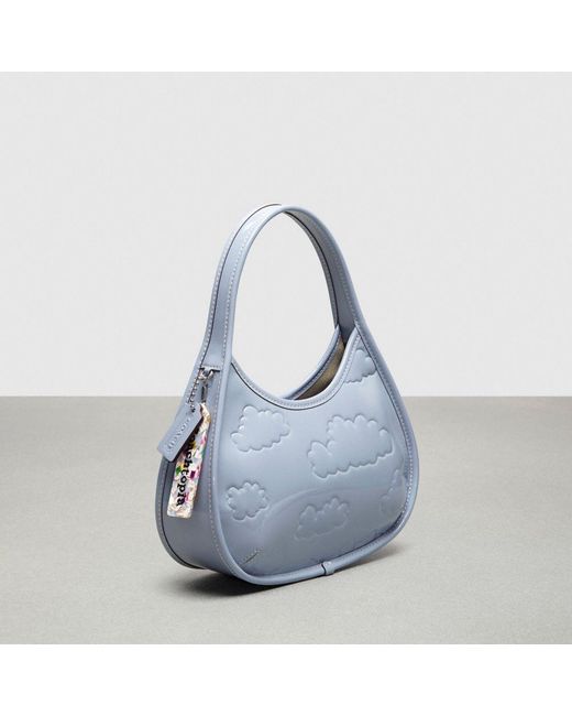 COACH Blue Ergo In Crinkled Patent Topia Leather: Embossed Cloud Print