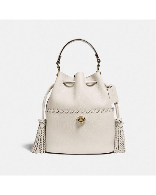 COACH Leather Lora Bucket Bag With Whipstitch Detail in Brass/Chalk (Natural) - Lyst