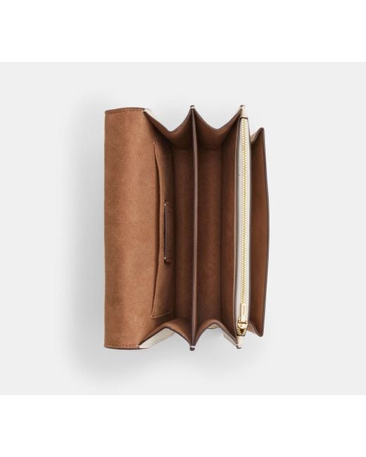 Bolso cruzado Klare de lona de firma COACH de color Black