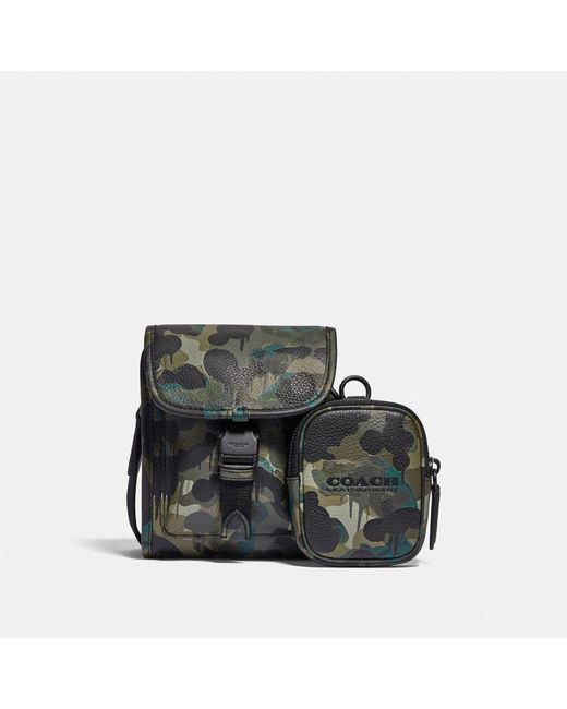 Bolso cruzado Charter North/South con bolsa híbrida con estampado de  camuflaje COACH de Cuero de color Verde para hombre | Lyst