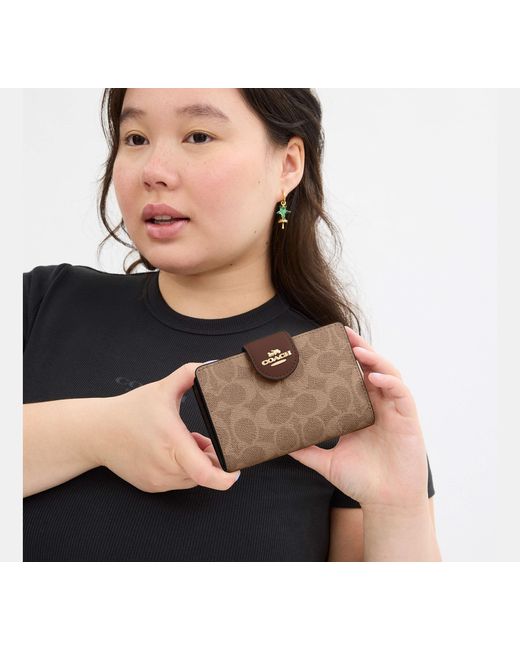 COACH Brown Signature Canvas Zip Wallet