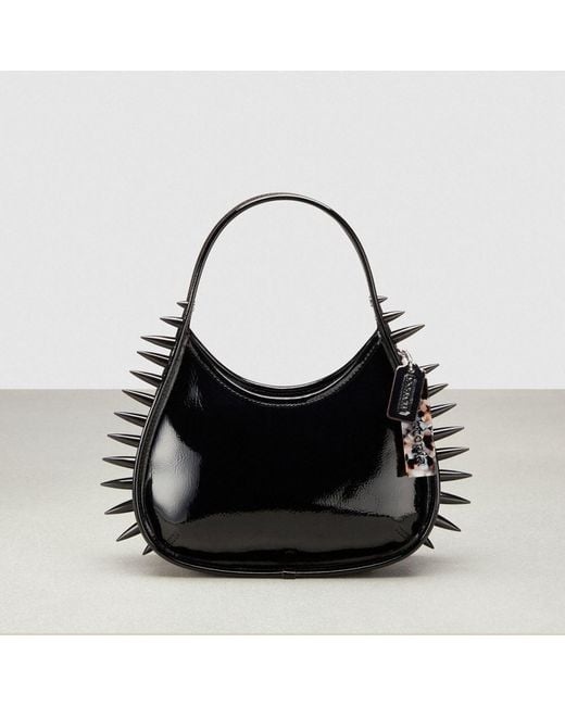 COACH Black Ergo Bag In Crinkle Patent Topia Leather: Spikes All Over
