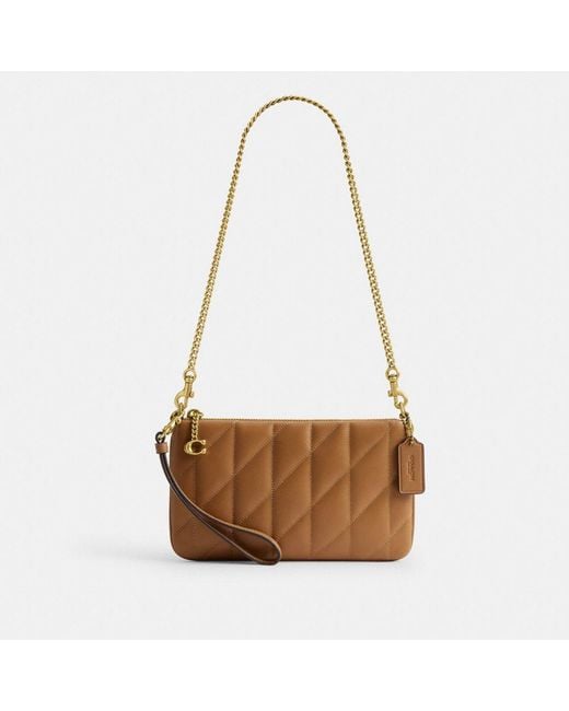 COACH Pouch Bag With Pillow Quilting in Brown | Lyst