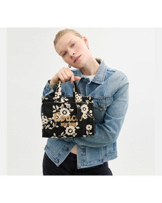 COACH Black Cargo Tote 26 Mit Blumenprint