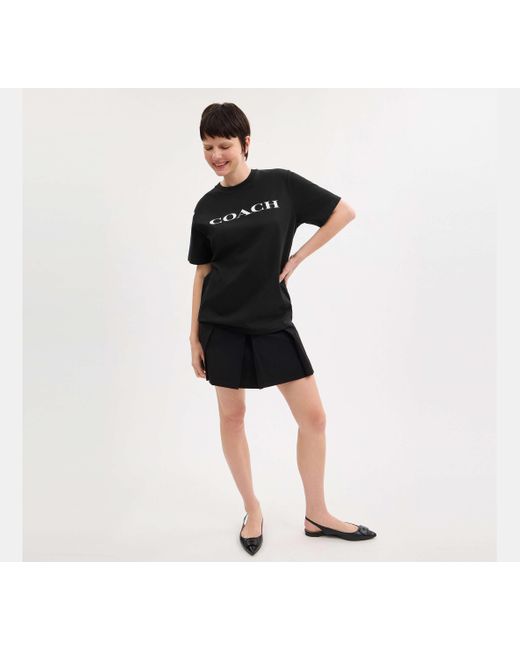 Camiseta de firma en algodón orgánico COACH de color Black