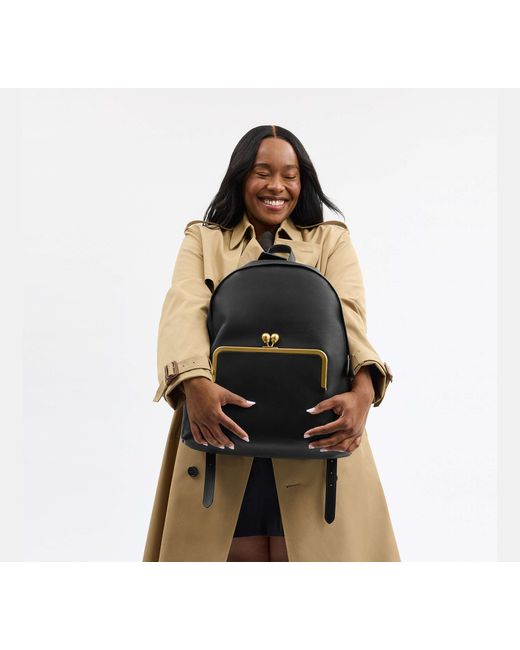 COACH Black Kisslock Frame Backpack
