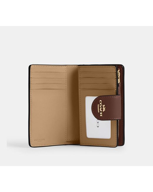 COACH Brown Signature Canvas Zip Wallet