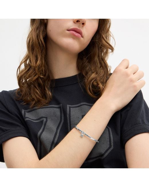COACH White Star Charm Thin Hinged Bangle