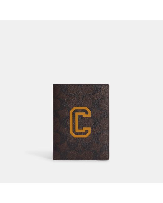 Coach Outlet Passport Case In Signature Canvas With Varsity Motif in