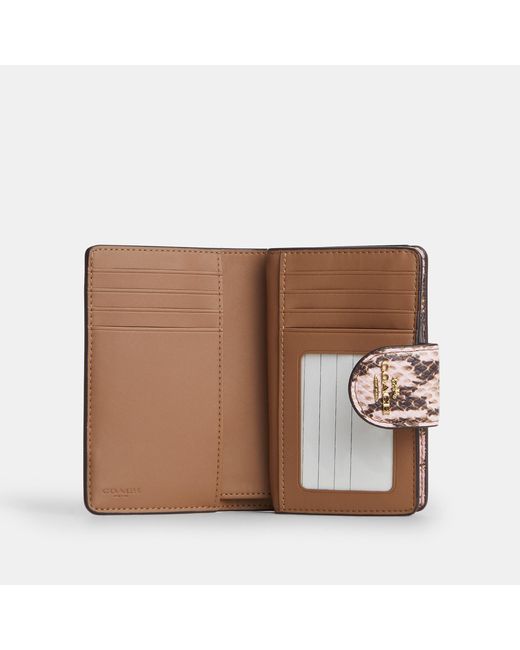 COACH Pink Medium Corner Zip Wallet