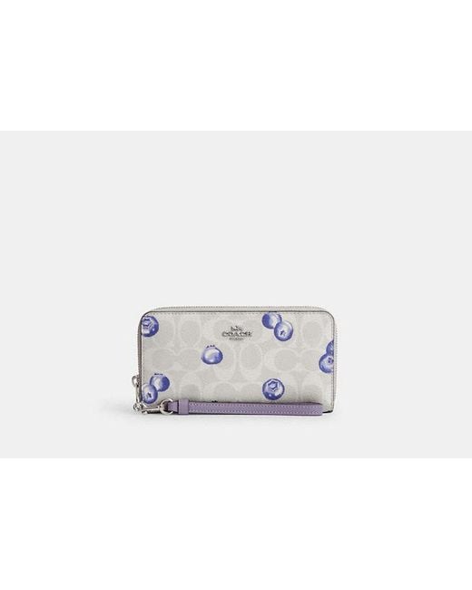 COACH Black Long Zip Around Wallet In Signature Canvas With Blueberry Print