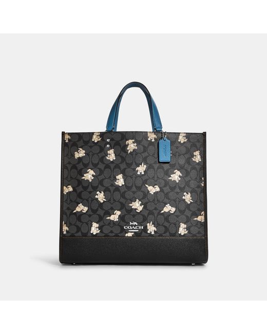 Coach Outlet Black Dempsey Tote 40 In Signature Canvas With Happy Dog Print