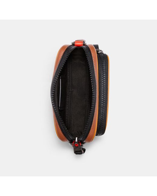 mini edge double pouch crossbody in colorblock with coach patch